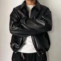 Black leather (or faux-leather) bomber-style jacket
