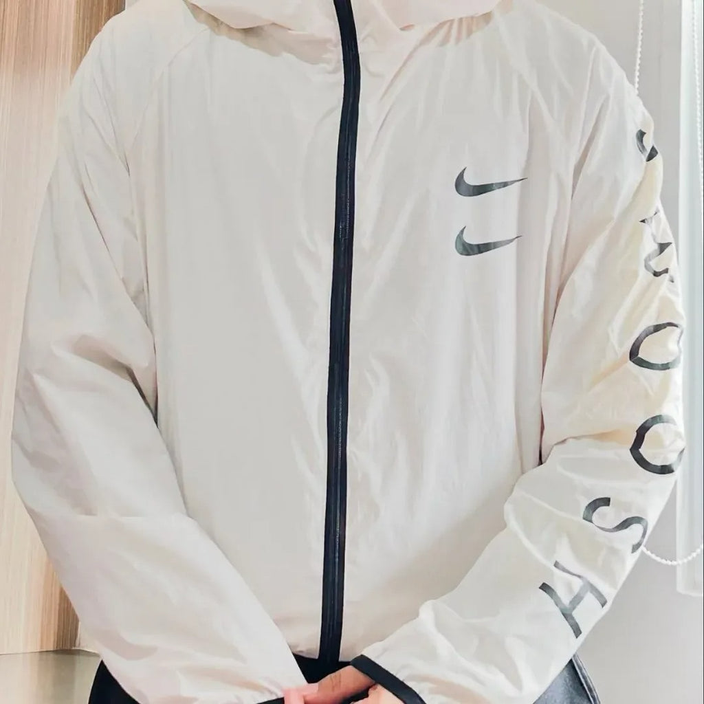 Vintage-style Nike hooded windbreaker jacket