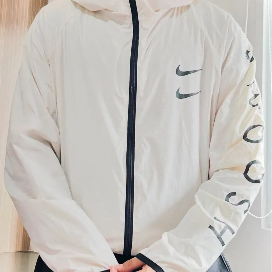 Vintage-style Nike hooded windbreaker jacket