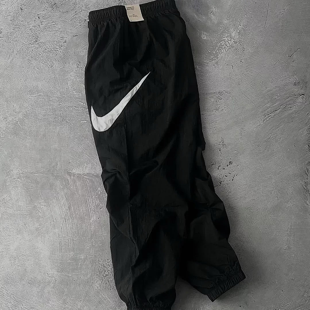 vintage-style Nike nylon track pants