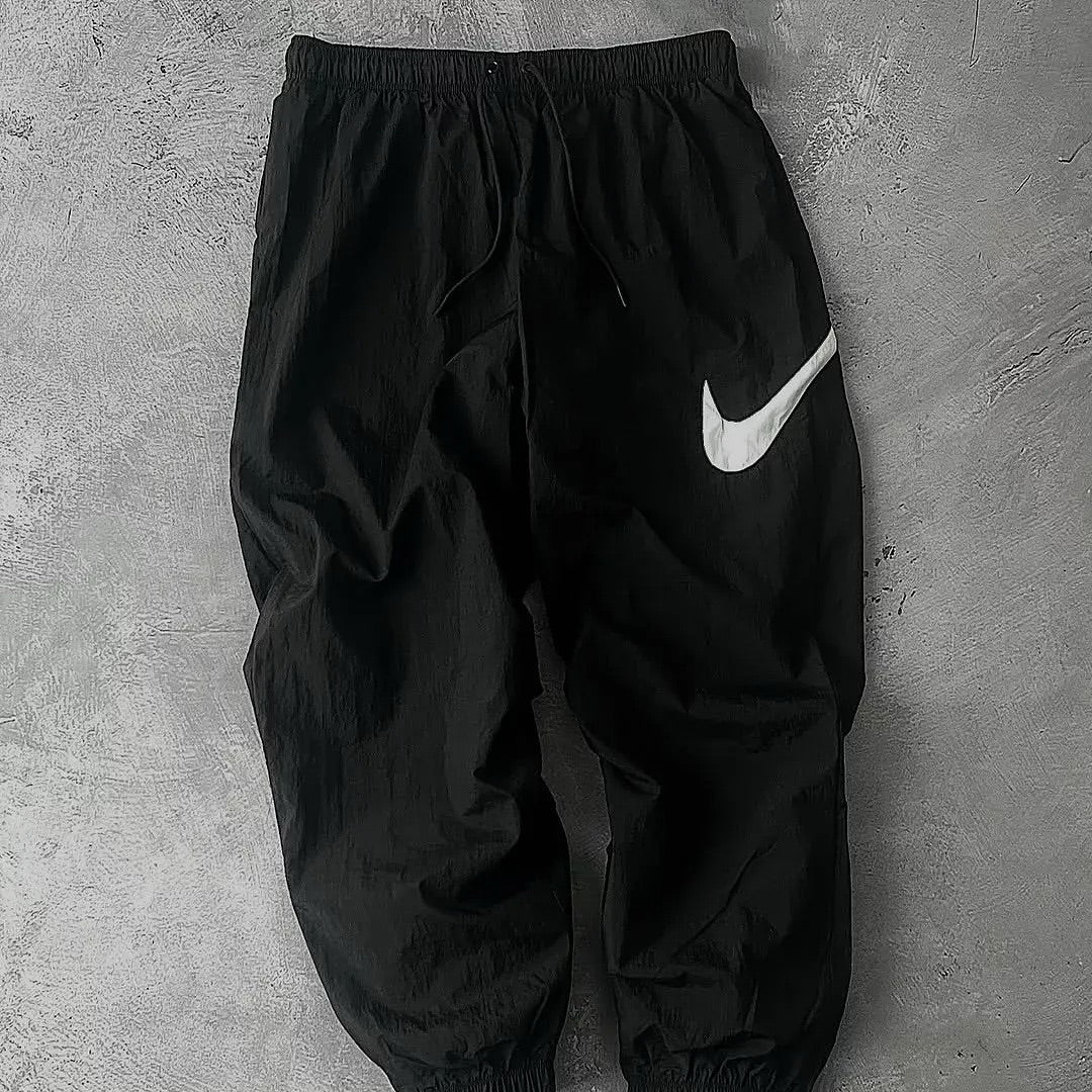 vintage-style Nike nylon track pants