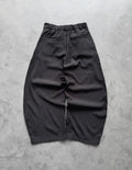 pinstripe trousers combine classic tailoring with modern streetwear elements
