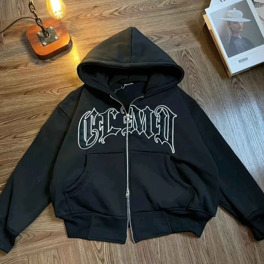 boxy-fit, black zip-up hoodie featuring Gothic/Old English style lettering