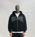 boxy-fit, black zip-up hoodie featuring Gothic/Old English style lettering
