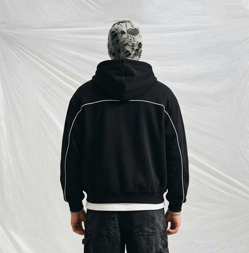 boxy-fit, black zip-up hoodie featuring Gothic/Old English style lettering