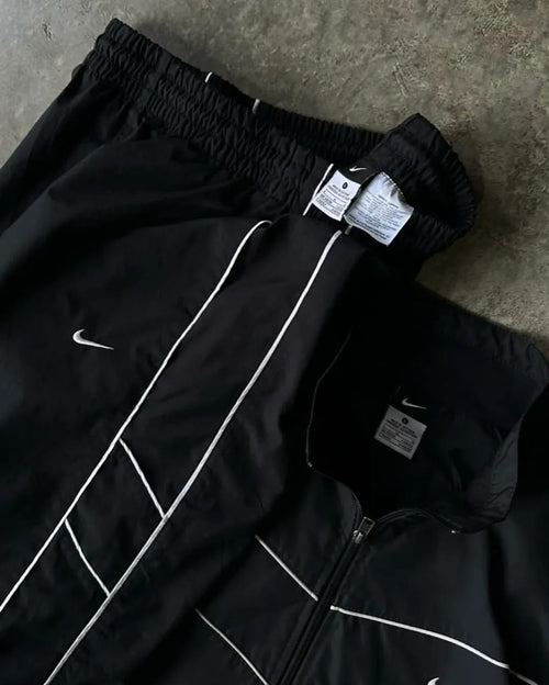 all-black Nike windbreaker set
