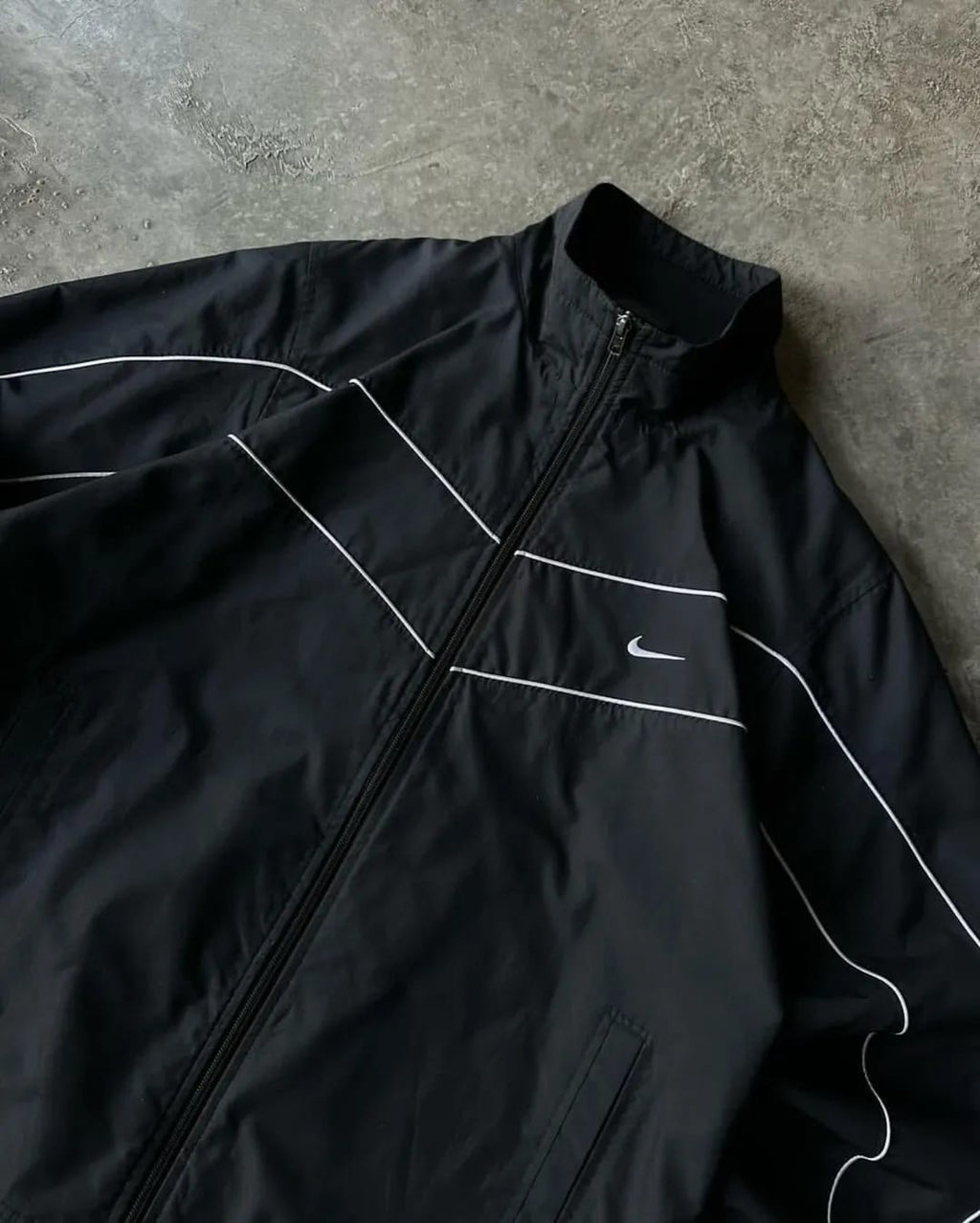 all-black Nike windbreaker set