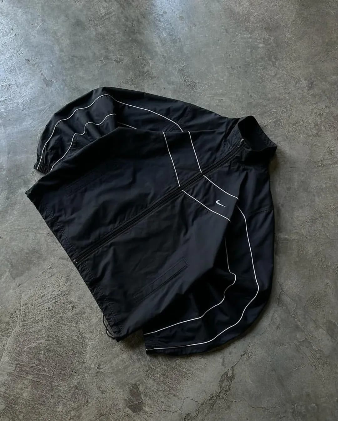 all-black Nike windbreaker set